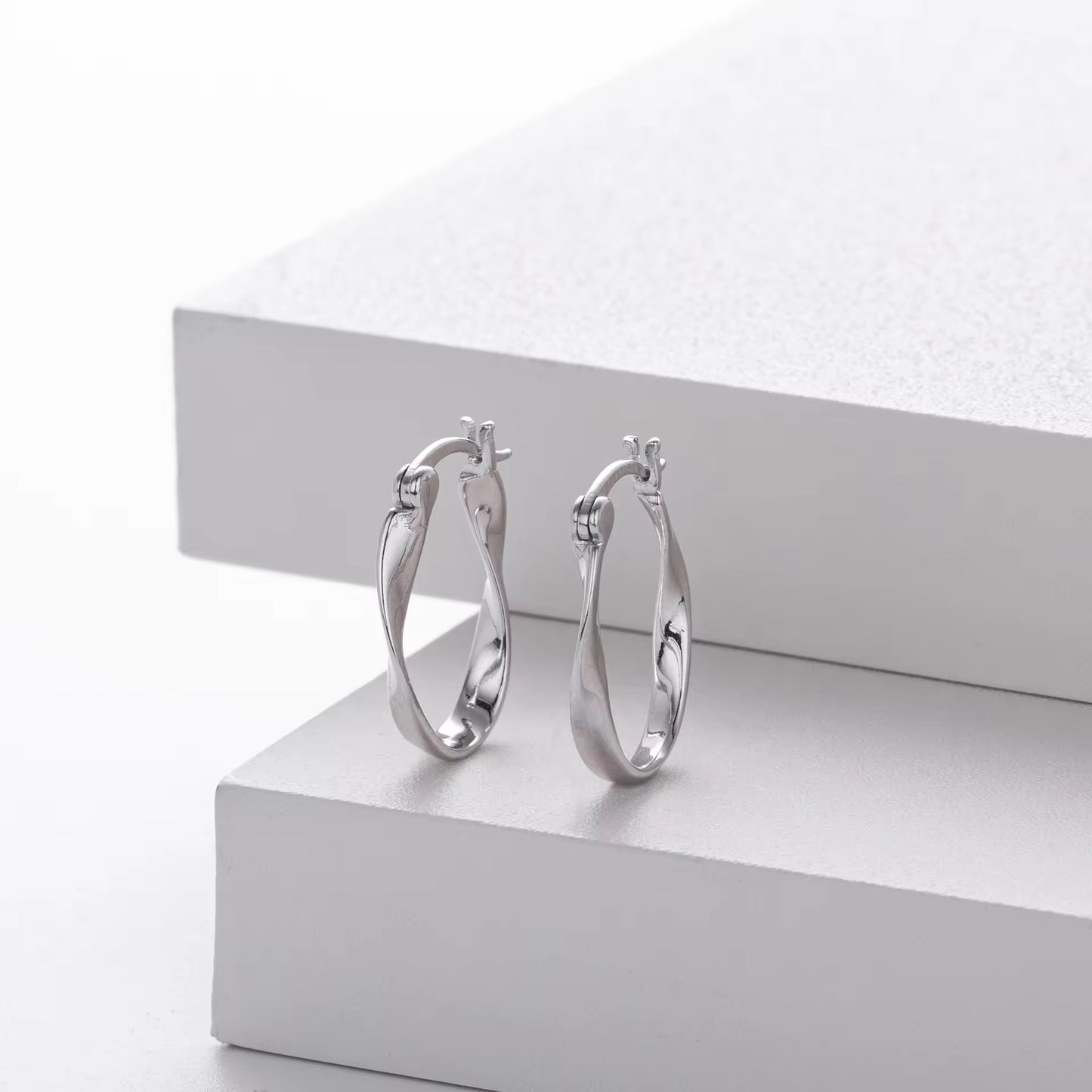 Silver  Infinity Twist Oval Hoops