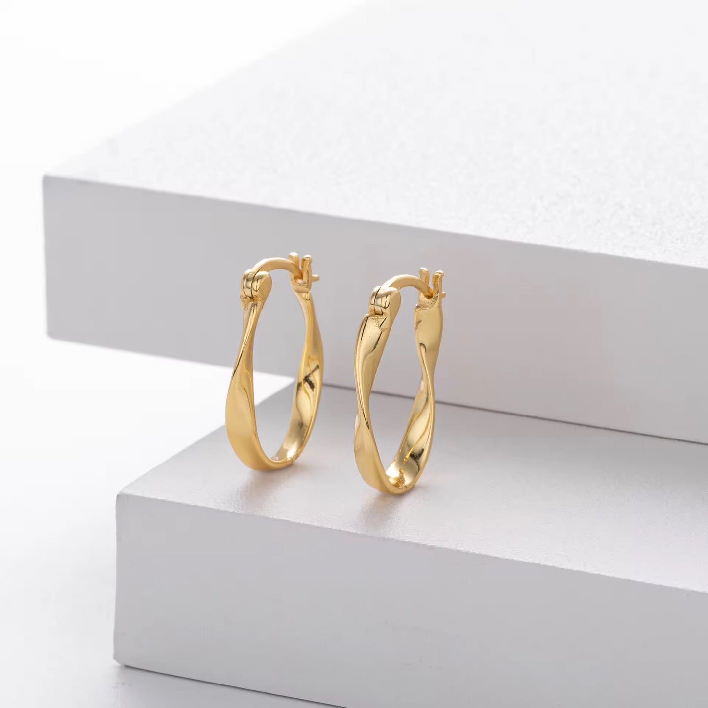 Silver  Infinity Twist Oval Hoops